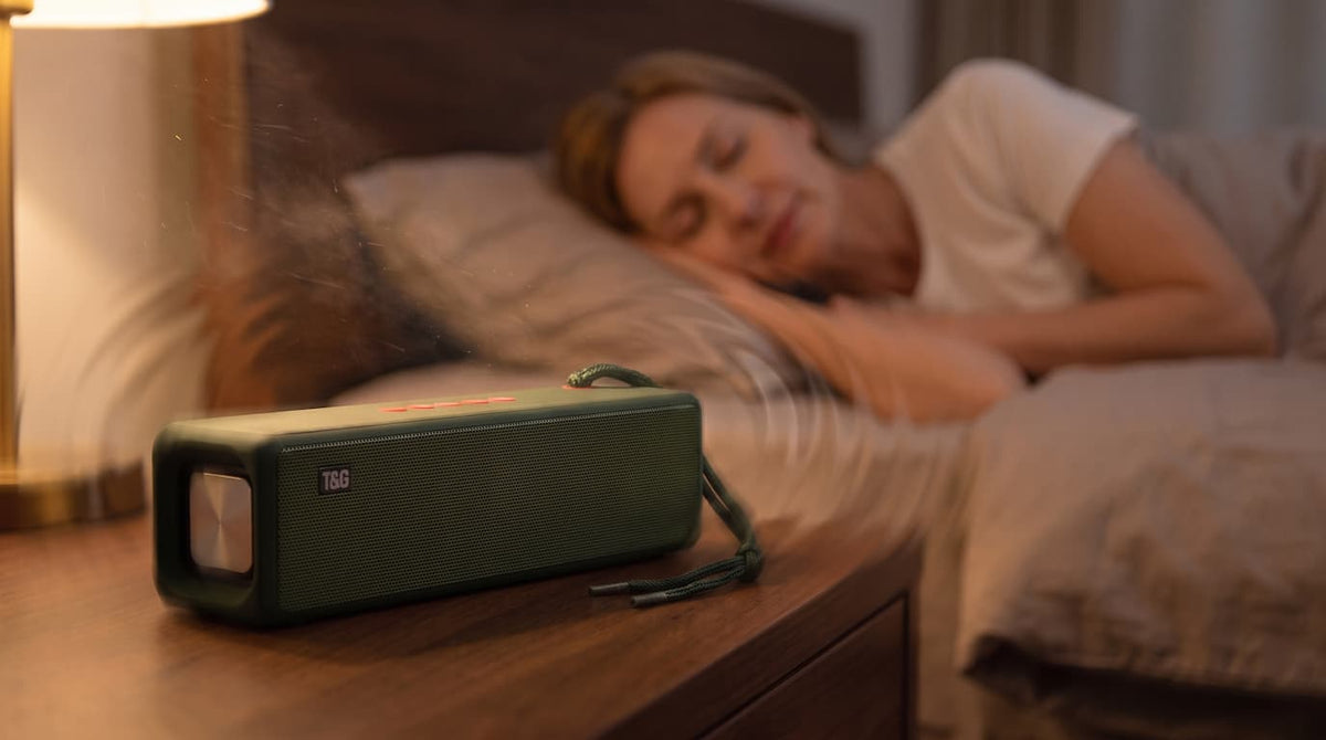 Amatro Vibrational Speaker on a bedside table in the evening